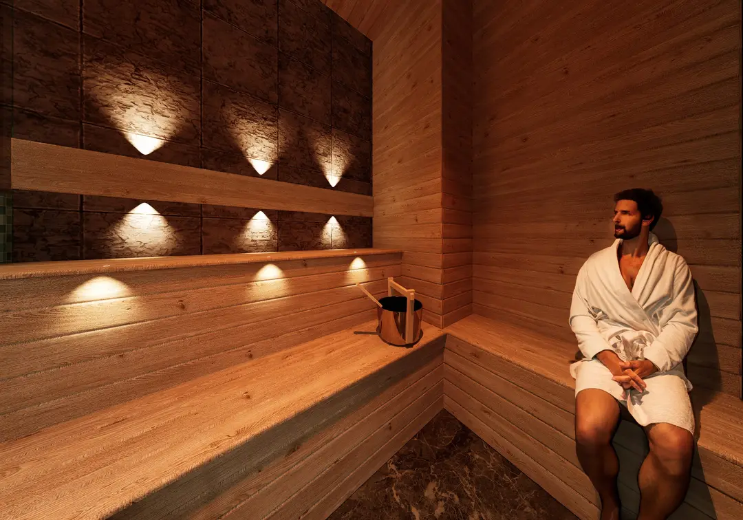 Sauna de madera con iluminación indirecta