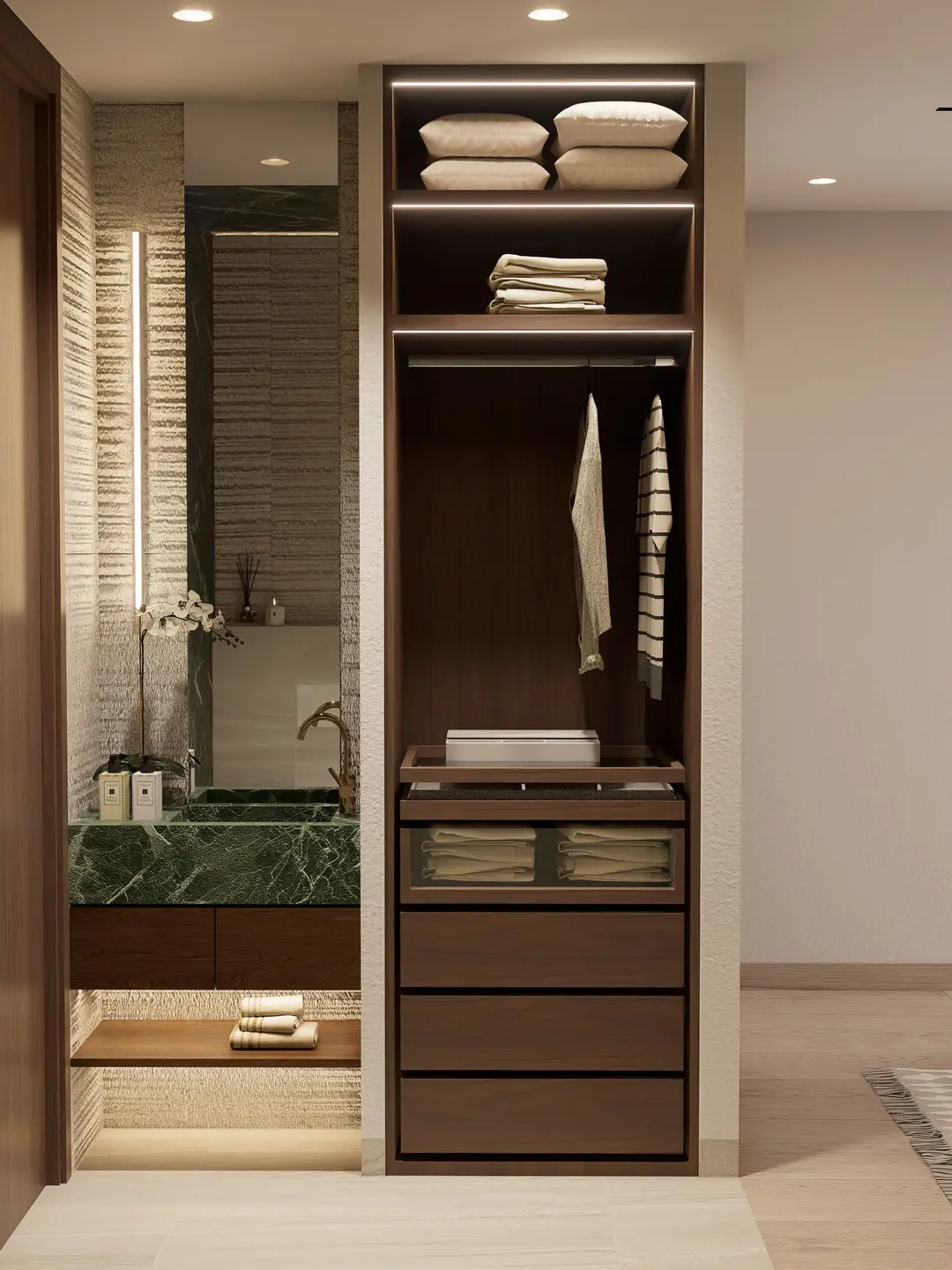 Vestidor iluminado y lavabo de mármol verde